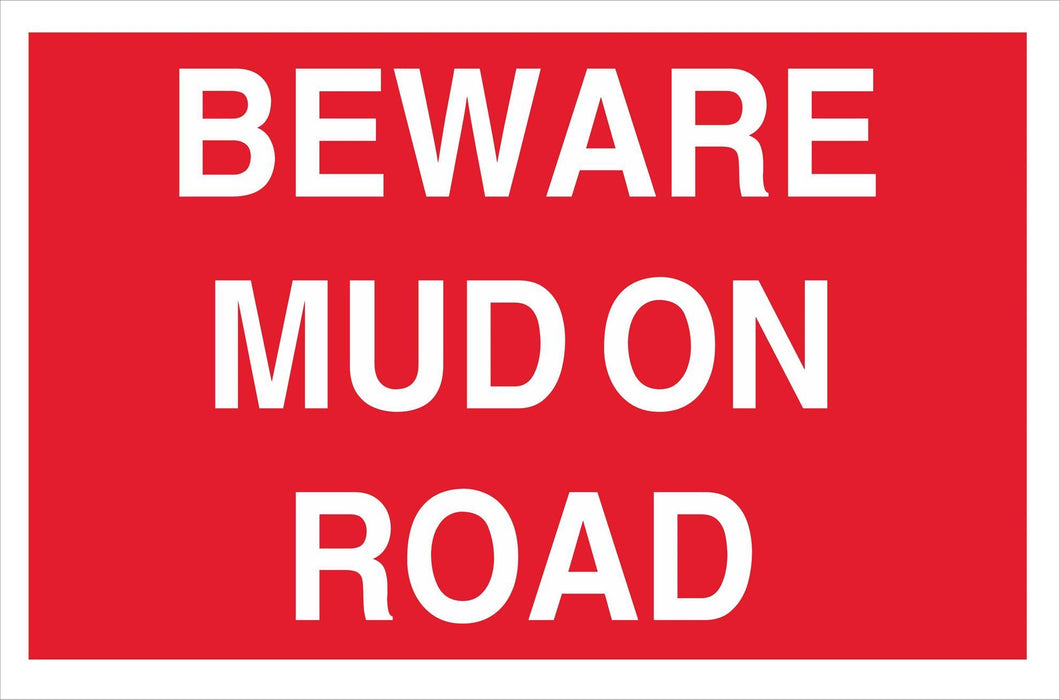 BEWARE MUD ON ROAD
