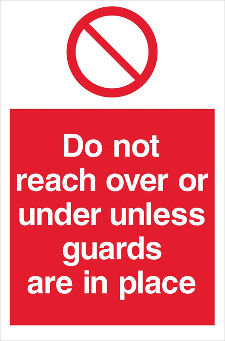 Do not reach over or under unless guards….
